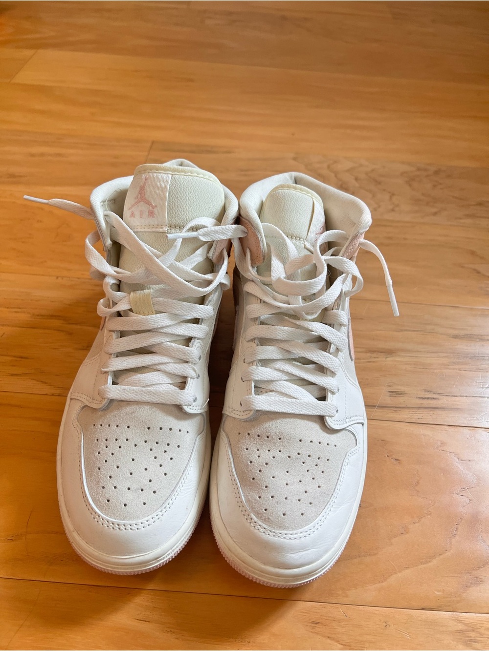 Pink and White Nike Air Jordans